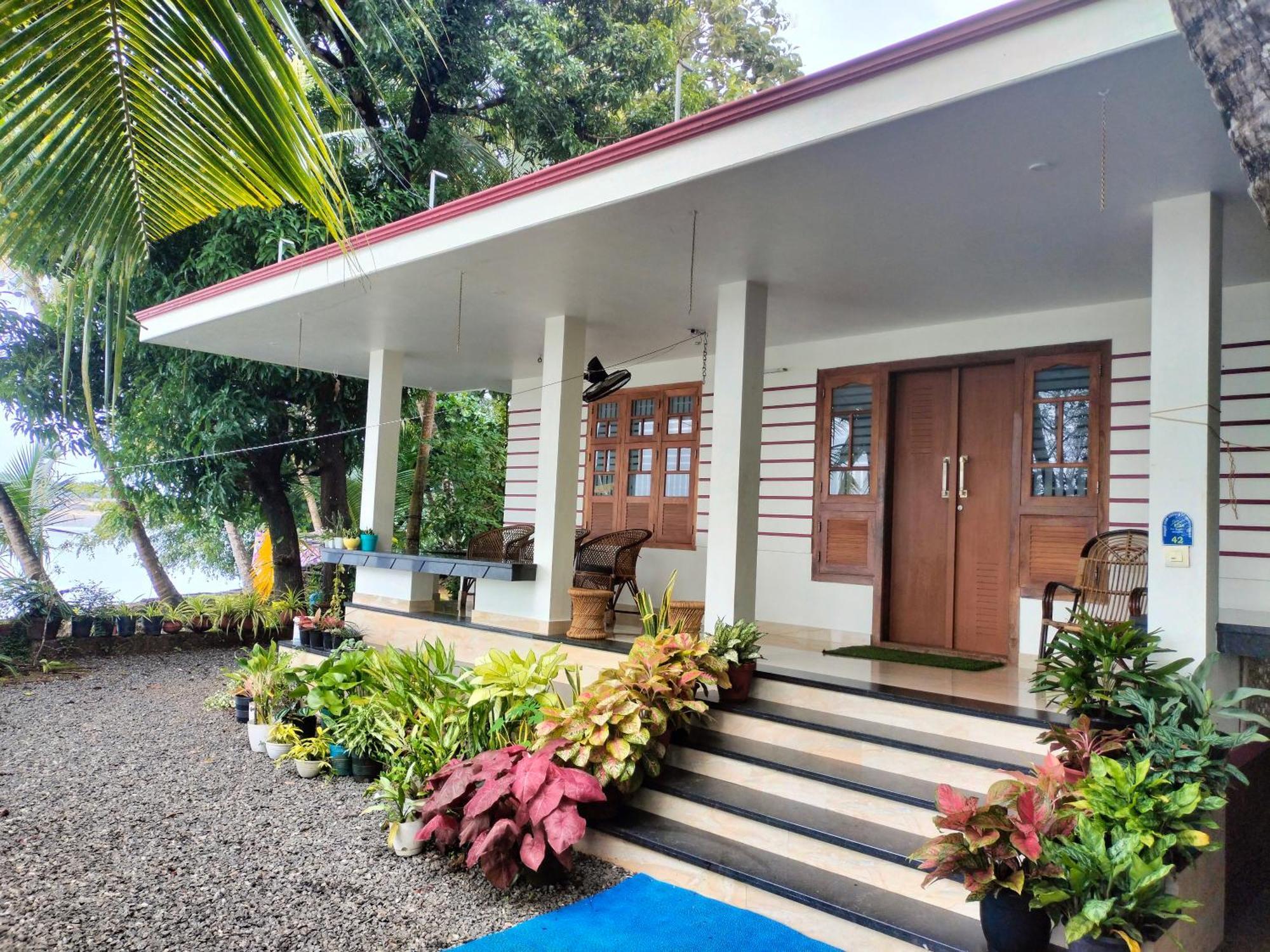 Green Island Homestay Riverside Kozhikode Exterior photo